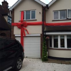 Red Padded Giant 1m, plus 20m of extra-wide ribbon to wrap building