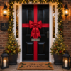 Red padded satin Christmas door bow with matching ribbon on a black front door Image