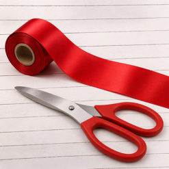 Red Handled Scissor and red ribbon
