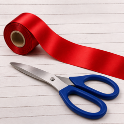 Blue Handled Scissor and red ribbon