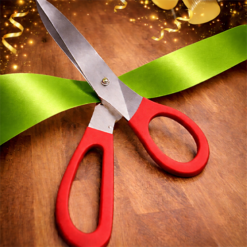 BIG RED HANDLED SCISSORS WITH LIME GREEN RIBBON FOR RIBBON CUTTING EVENTS