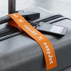 Logo Printed Onto A Marigold Orange Ribbon