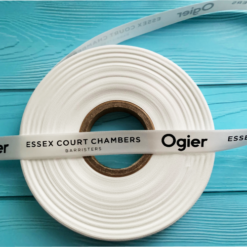 Logo Printed On An Off White Ribbon