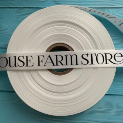 Logo Printed On An Off White Ribbon