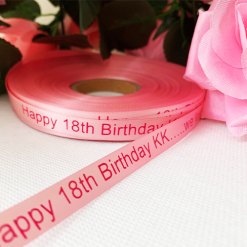 Logo Printed Onto A Pastel Pink Ribbon