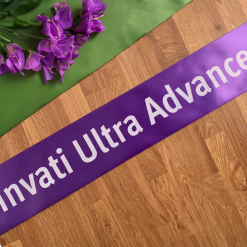 Purple Ribbon Branded With A White Logo