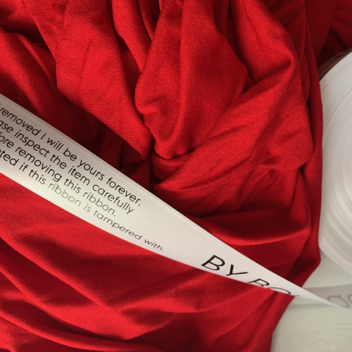White Ribbon With Black Print For Security of Clothes Preventing Returns Once Worn By Personalised Printed Ribbons Next Day Delivery