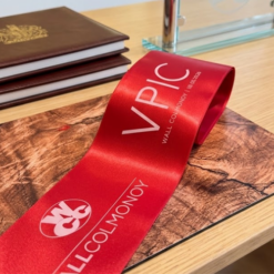 Logo Printed Onto A Red Ribbon