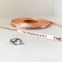 Peach Narrow Ribbon With A Black Print For A Jewellers