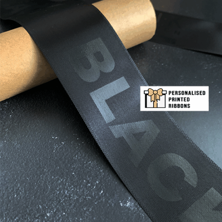 Black Print On Black Ribbon Logo