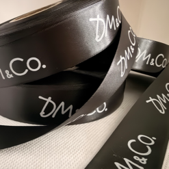 Black Ribbon With White Logo Print Our Speciality