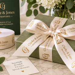Cream satin ribbon custom printed with metallic gold logo